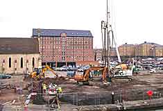 Drilling for piles for the Barge Arm apartments at Gloucester Docks